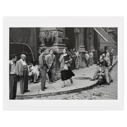 Black and white photo of a street scene with people in an urban setting from American Girl in Italy by Ruth Orkin. 